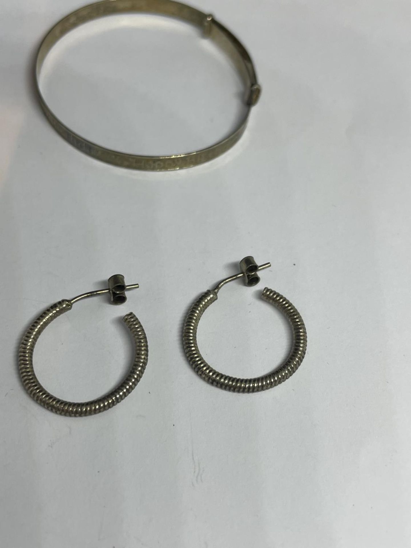 TWO MARKED SILVER BANGLES AND TWO PAIRS OF SILVER EARRINGS - Image 2 of 3