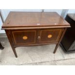 AN EDWARDIAN MAHOGANY SIDE CABINET WITH TWO INLAID DOORS 36" WIDE