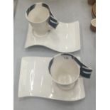 A PAIR OF VILLEROY AND BOCH MODERNIST WAVE CUPS AND SAUCERS WITH BLUE PATTERNING