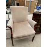 A PARKER KNOLL FIRESIDE CHAIR MODEL NO. P.K. 749-1014