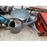 TWO GALVANISED WATERING CANS AND AN ICE BUCKET