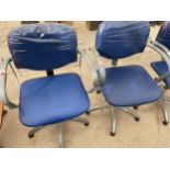 A PAIR OF MODERN ADJUSTABLE BLUE SALON CHAIRS ON ALLOY BASE