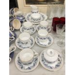 A ROYAL STANDARD 'TREND' TEASET TO INCLUDE A CAKE PLATE, CUPS, SAUCERS, CREAM JUG AND A SUGARBOWL