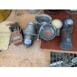 AN ASSORTMENT OF VINTAGE AUTOMOBILE LAMPS