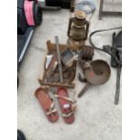 AN ASSORTMENT OF VINTAGE ITEMS TO INCLUDE A PULLY HOOK, A PARAFIN LAMP AND CAST IRON WEIGHT