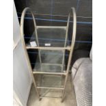 A MODERN METALWARE FOUR TIER OPEN DISPLAY STAND WITH GLASS SHELVES, 13X12"
