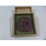 A BOXED JAPANESE BRONZE TSUBA