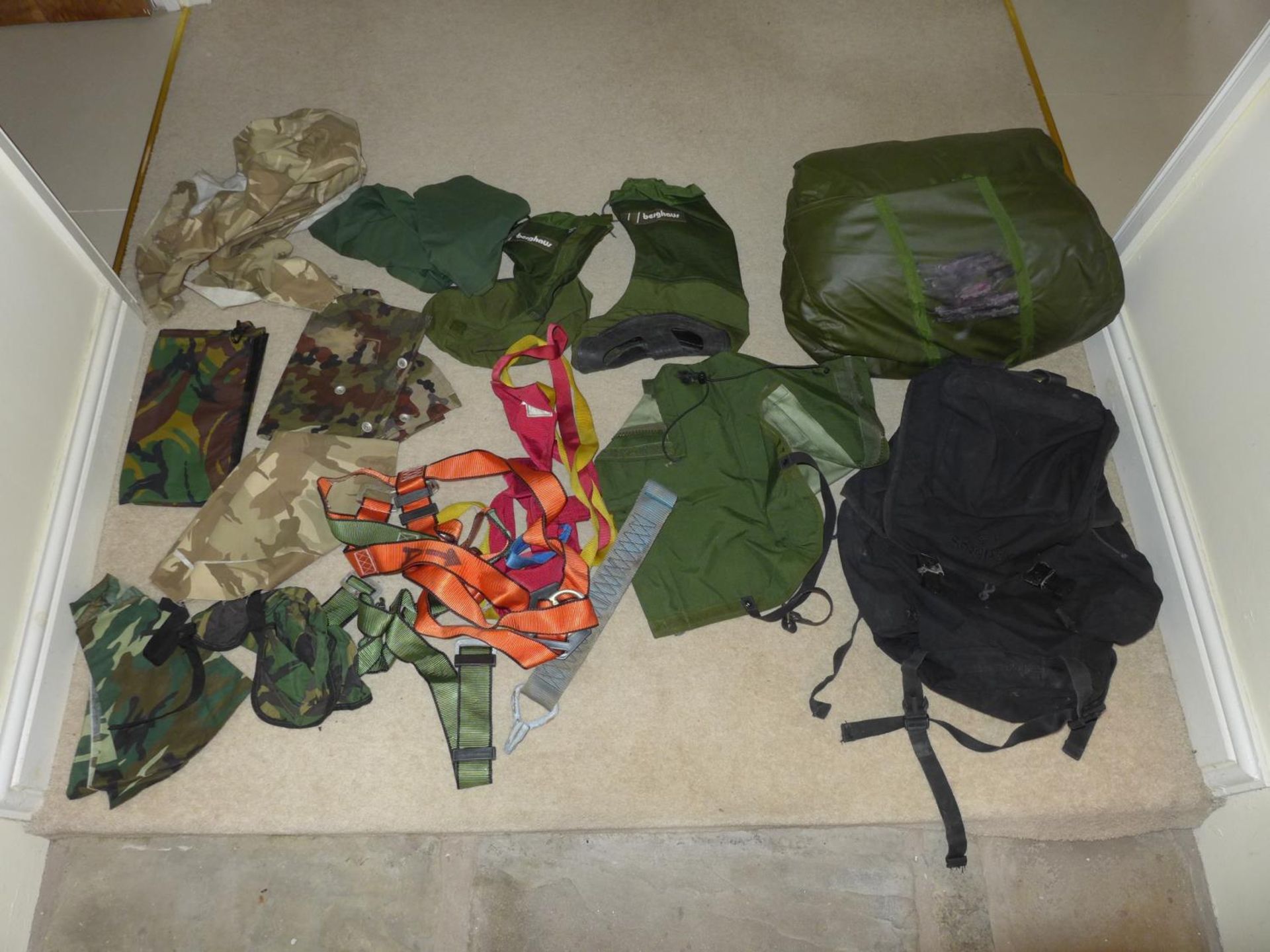 A COLLECTION OF MILITARY EQUIPMENT, BACKPACK, SLEEPING BAG, HARNESS, BERGHANS BAGS ETC