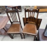 A PAIR OF EARLY 20TH CENTURY OAK DINING CHAIRS
