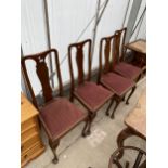 A SET OF FOUR MAHOGANY QUEEN ANNE STYLE DINING CHAIRS