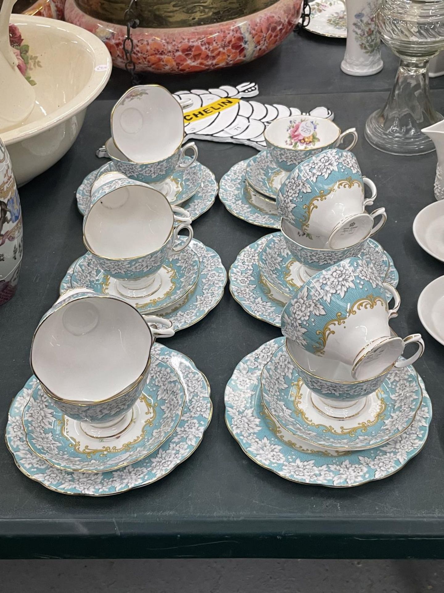 A QUANTITY OF ROYAL ALBERT 'ENCHANTMENT' CUPS, SAUCERS AND SIDE PLATES