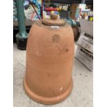 A VINTAGE TERRACOTTA LIDDDED POT