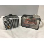 A VINTAGE INTERNATIONAL AUDITION TRANSISTOR RADIO IN THE SHAPE OF A CAR FRONT RADIATOR GRILL PLUS