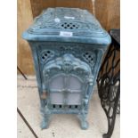 A VINTAGE DEVILLE AND CO ENAMELED CAST IRON LOG BURNING STOVE (FRONT PLATE REQUIRES ATTENTION -
