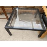 A MODERN BLACK PAINTED METALWARE FRAMED COFFEE TABLE WITH GLASS TOP, 29" SQUARE