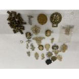 A COLLECTION OF BRITISH ARMY STAYBRITE BADGES, SPENT BULLETS ETC