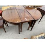 A GEORGE III MAHOGANY EXTENDING D-END DINIGN TABLE INCORPORATING CENTRAL DROP-LEAF TABLE SECTION,