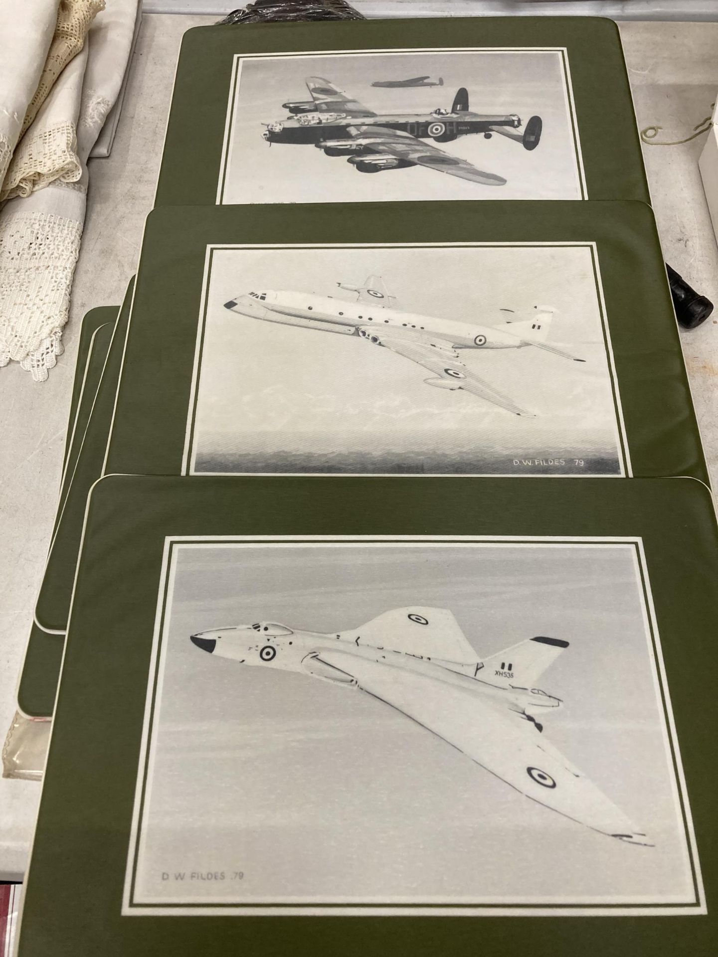 A SET OF SIX BRITISH AEROSPACE PLASTIC PLACEMATS FEATURING DIFFERENT AVRO AIRCRAFT, SIGNED AND DATED - Image 2 of 2