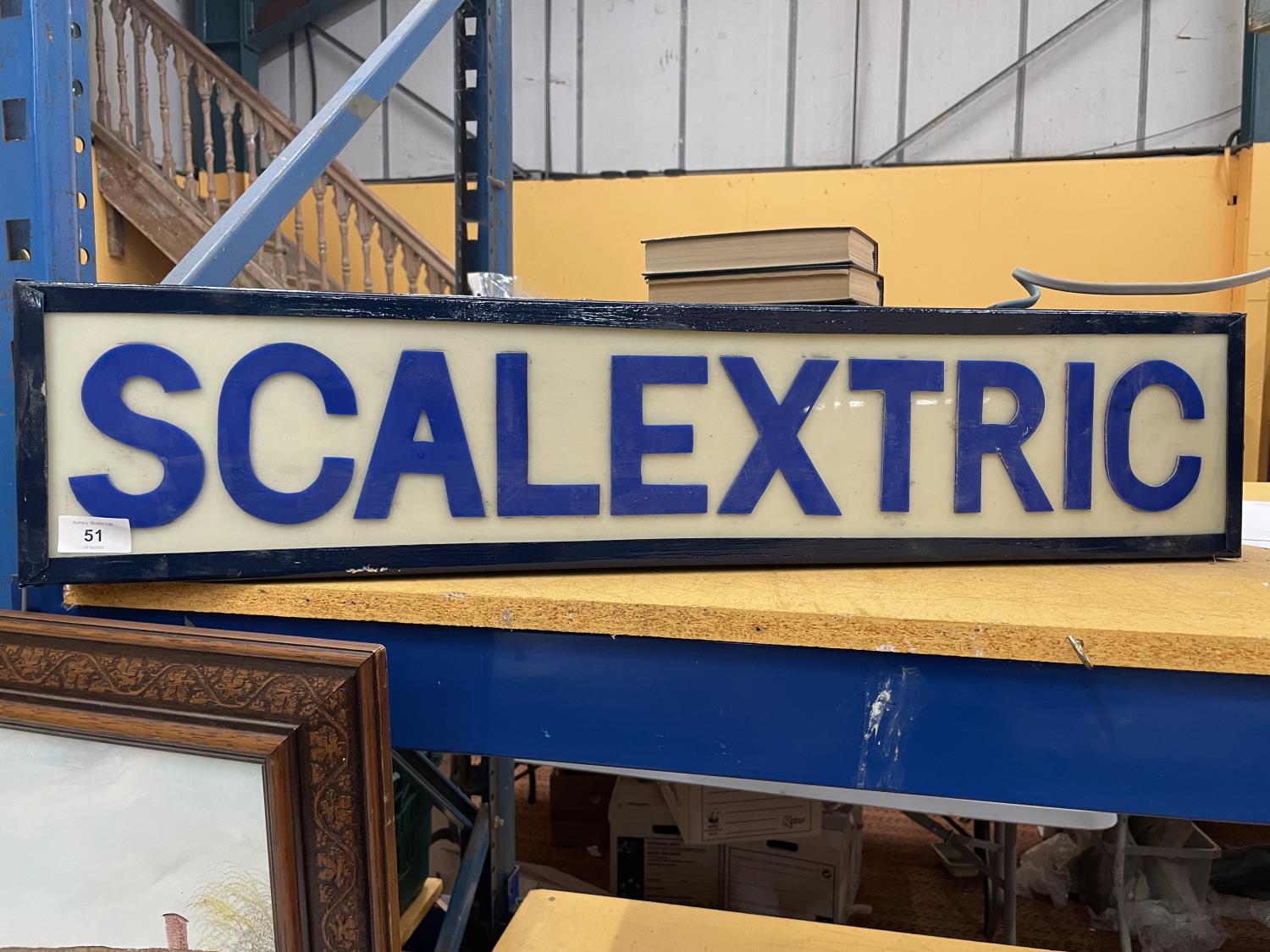 AN ILLUMINATED "SCALEXTRIC" SIGN (LENGTH 81CM, HEIGHT 18CM)