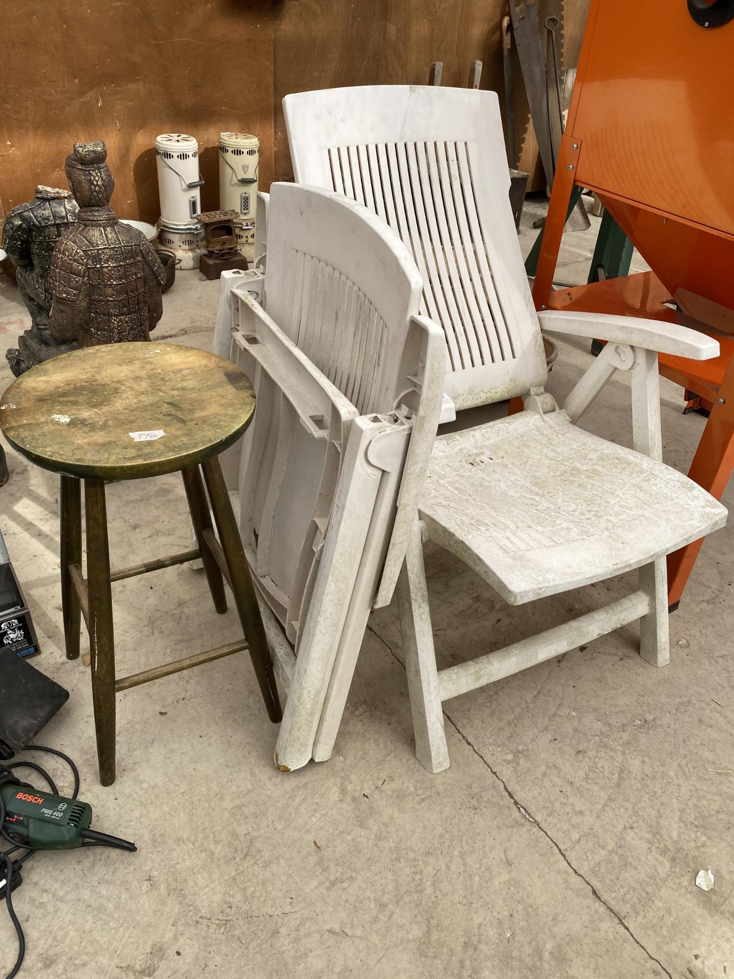 TWO PLASTIC FOLDING GARDEN CHAIRS AND A WOODEN STOOL