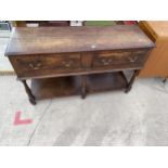 AN OAK GEORGE III STYLE SMALL DRESSSER WITH TWO DRAWERS, POT BOARD ON TURNED LEGS, 49" WIDE
