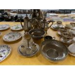A QUANTITY OF SILVER PLATED ITEMS TO INCLUDE A COFFEE POT, TEAPOT, HANDLED BASKET, BOWL, CRUET SET
