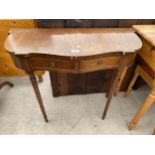 A REPRODUCTION MAHOGANY AND CROSSBAND SIDE TABLE WITH TWO DRAWERS 31" WIDE