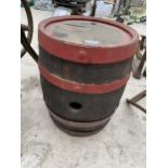 A SMALL VINTAGE WOODEN AND METAL BANDED BARREL