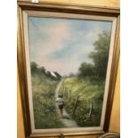 A LARGE FRAMED OIL ON CANVASS OF A BOY GOING FISHING SIGNED P CITRIN 80CM X 110CM