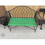 A WROUGHT IRON TWO SEATER GARDEN BENCH WITH WOODEN SLATTED SEAT (L:134CM)