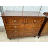 A 19TH CENTURY MAHOGANY CHEST OF THREE GRADUATED DRAWERS THE TOP DRAW BEING A SHAM TO REVEAL A