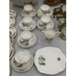 A QUANTITY OF SUTHERLAND CHINA CUPS, SAUCERS, SIDE PLATES AND A CAKE PLATE