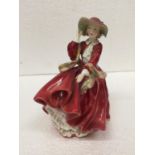 A ROYAL DOULTON 'TOP OF THE HILL' FIGURE HN 1834