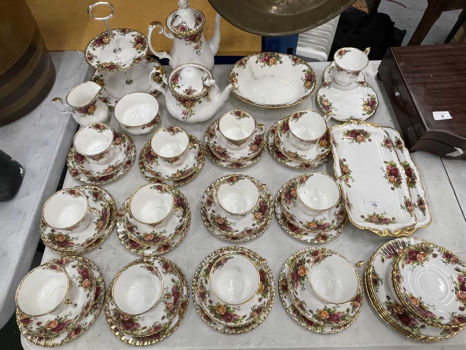 A LARGE COLLECTION OF ROYAL ALBERT OLD COUNTRY ROSES TO INCLUDE TRIOS, CAKE PLATE, SANDWICH PLATES