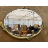 A DECORATIVE WOODEN FRAMED BEVELED EDGE WALL MIRROR