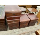A MODERN MAHOGANY EFFECT CHEST OF FIVE DRAWERS AND A PAIR OF BEDSIDE CHESTS