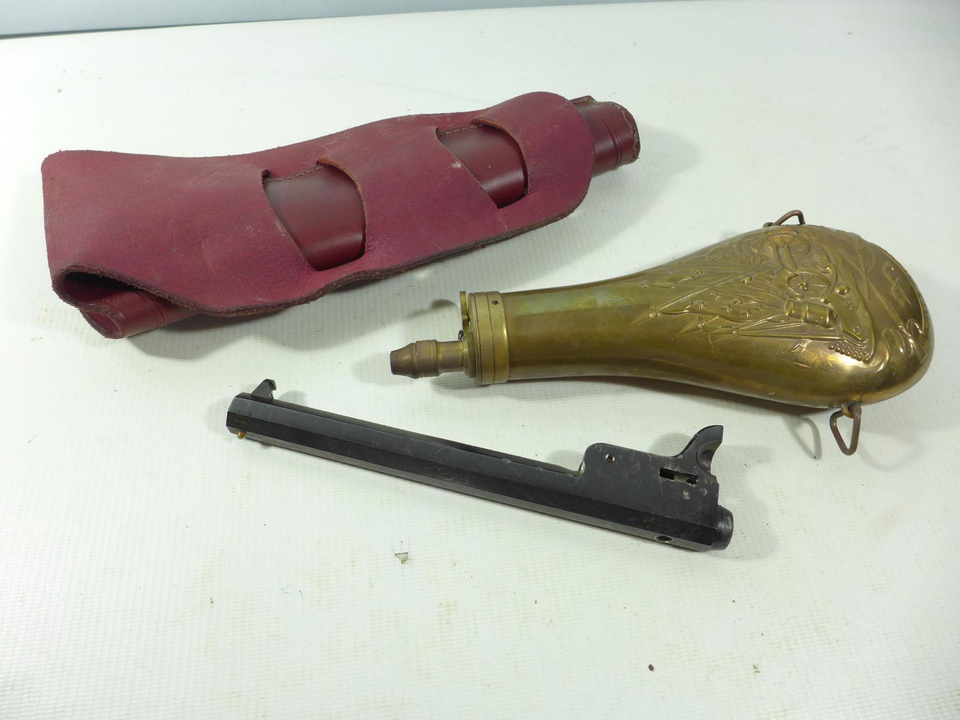 A COPPER AND BRASS POWDER FLASK, LEATHER HOLSTER AND A BLOCKED NAVY COLT BARREL (3) - Image 2 of 3