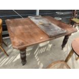 A LATE VICTORIAN MAHOGANY WIND-OUT DINING TABLE, 57X47" WITH EXTRA LEAF 17", ON TURNED AND FLUTED