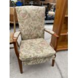 A PARKER KNOLL FIRESIDE CHAIR MODEL NO P.K. 753/6 MK.1