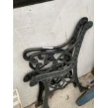 TWO CAST IRON LEFT HANDED BENCH ENDS