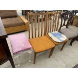 A PAINTED STOOL ON CABRIOLE LEGS AND A PAIR OF RETRO TEAK DINING CHAIRS