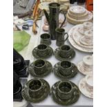 AN ELLGREAVE POTTERY SAXONY DARK GREEN COFFEE SET TO INCLUDE A COFFEE POT, CREAM JUG, SUGAR BOWL,