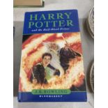 A FIRST EDITION HARDBACK HARRY POTTER AND THE HALF-BLOOD PRINCE BY J.K. ROWLING WITH DUST COVER