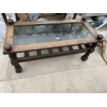 A MODERN SPANISH STYLE COFFEE TABLE