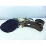 A 1951 MILITARY BERET, FIELD DRESSING BAG AND BELTS