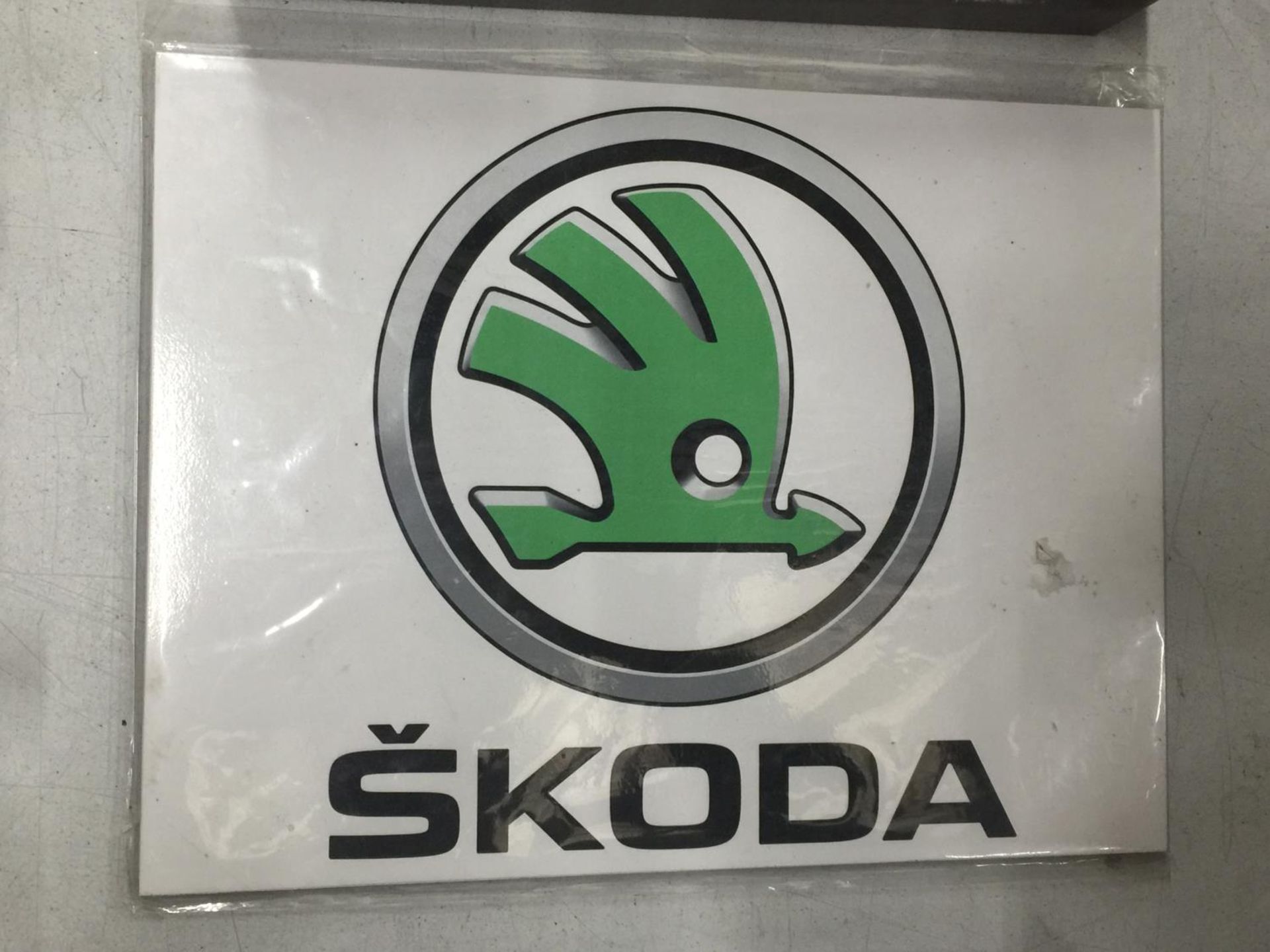 A SKODA METAL SIGN 25.5CM X 19.5CM