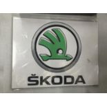 A SKODA METAL SIGN 25.5CM X 19.5CM