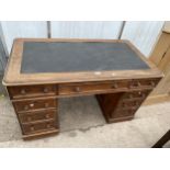 A VICTORIAN MAHOGANY TWIN PEDESTAL DESK ENCLOSING EIGHT SHORT AND ONE LONG DRAWER 46" X 25"