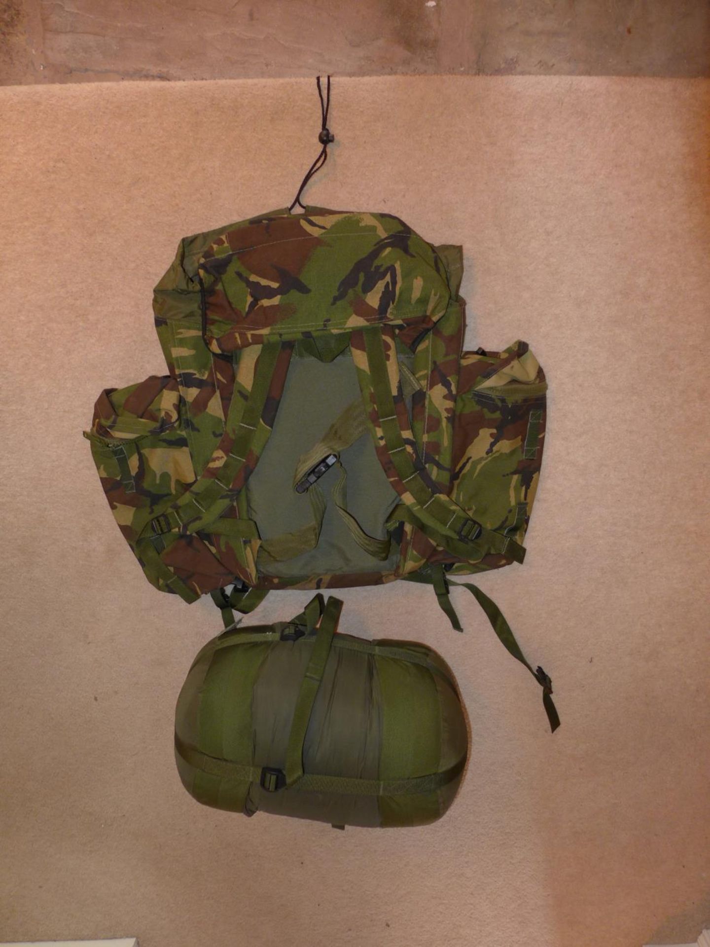 A BRITISH ARMY BERGEN BACKPACK AND A COMPRESSION BAG (2)