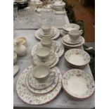 A COLLECTION OF JOHNSON BROS CERAMICS TO INCLUDE TRIOS, PLATES, DISHES ETC